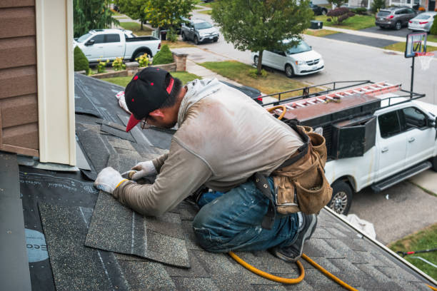 Professional Storm Damage Roof Repair technician working in Bedford, TX
